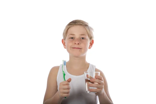 Młody chłopak szczotkowania zębów — Zdjęcie stockowe