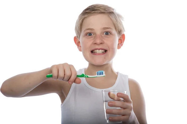 Giovane ragazzo lavarsi i denti — Foto Stock