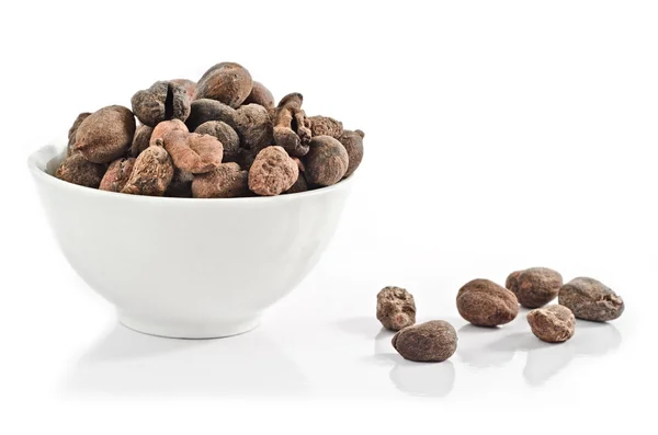 Cup full of shea nuts — Stock Photo, Image