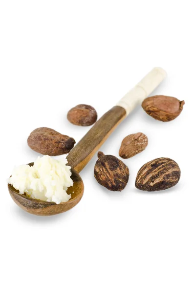 Löffel Sheabutter-Sahne und Shea-Nüsse — Stockfoto