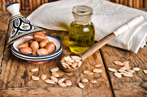 Still life of argan fruit and oil