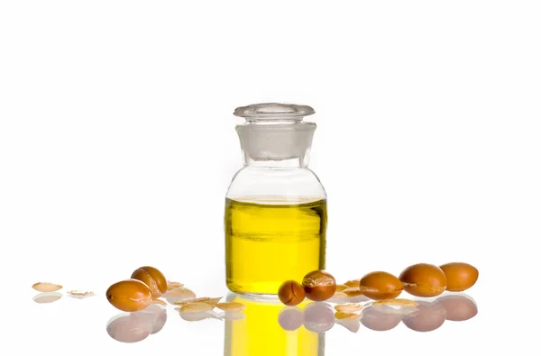 Argan oil with fruits — Stock Photo, Image