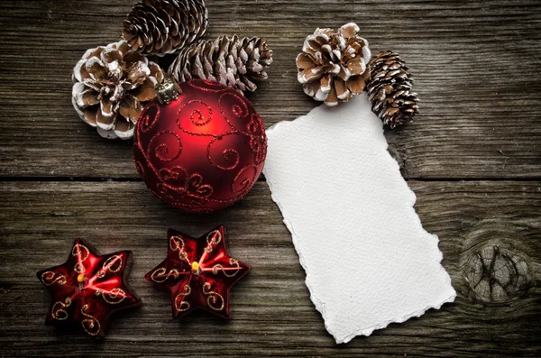 Christmas greeting card on wooden top — Stock Photo, Image