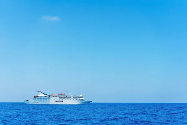 A big white passenger ship at sea . Liner to the Mediterranean Sea in Turkey on a sunny summer day