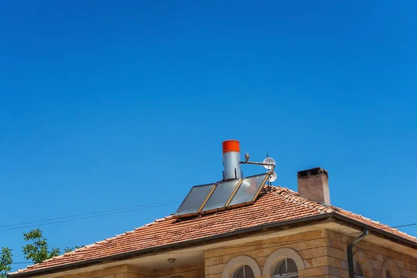 Solar water heater panels on the roof in Turkey in Cappadocia. Eco-friendly heaters