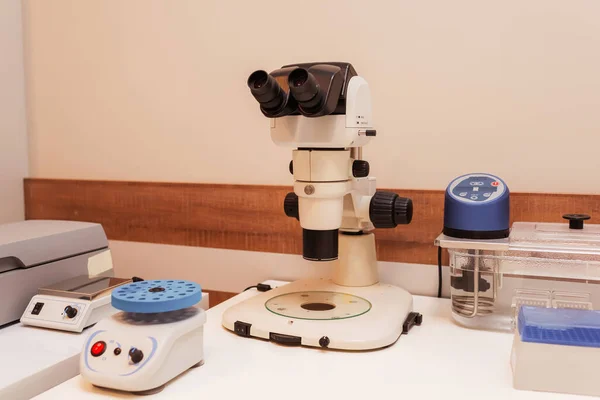 microscope in the center of reproductive medicine. microscope for examining eggs. equipment in the medical office.