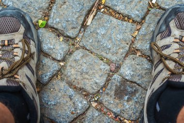 Turkish square granite tiles on the sidewalks in the park. Turkish pedestrian eco-friendly roads