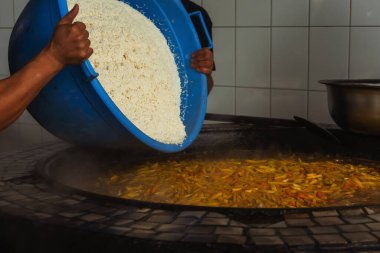 uzbek plov in tashkent. cooking pilaf in the tourist place of uzbekistan