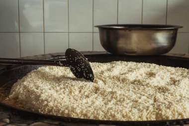 uzbek plov in tashkent. cooking pilaf in the tourist place of uzbekistan