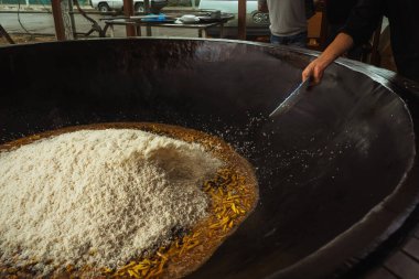 uzbek plov in tashkent. cooking pilaf in the tourist place of uzbekistan