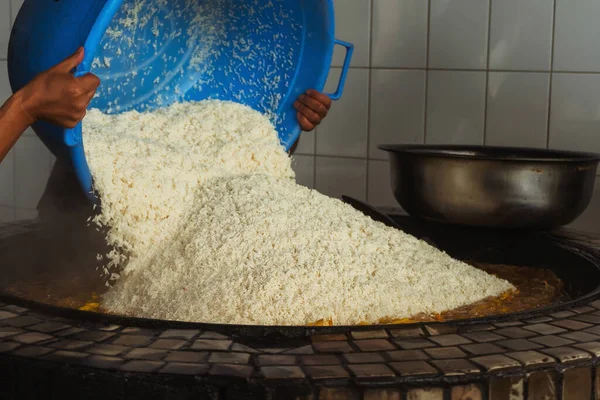 uzbek plov in tashkent. cooking pilaf in the tourist place of uzbekistan