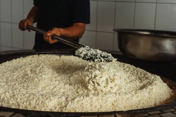 uzbek plov in tashkent. cooking pilaf in the tourist place of uzbekistan