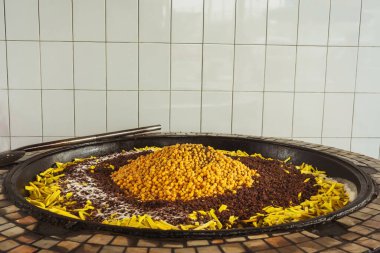 uzbek plov in tashkent. cooking pilaf in the tourist place of uzbekistan