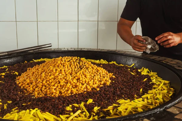 Man Adds Spices Uzbek Pilaf Cafe Uzbek Cook Pilaf Center — Stock Photo, Image