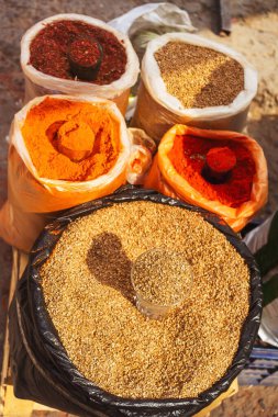 assorted spices in the tourist market of uzbekistan. different Uzbek spices for pilaf. spices in bulk at the bazaar of tashkent