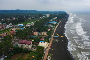 Hotels on the coastline with black sand in georgia. Magnetic sand on the beach in Magnetiti Batumi. Therapeutic boarding houses in the Ureki settlement for sick children