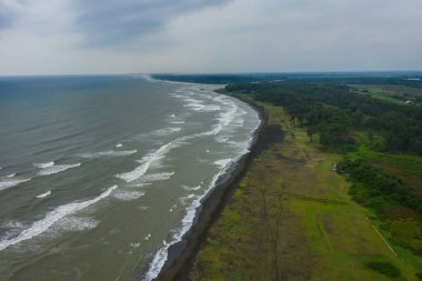 healing black sand beach in georgia. Magnetic sand on the beach in Magnetiti Batumi. High waves in the black Georgian sea in the village of Ureki
