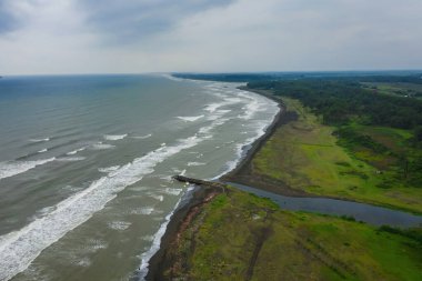 healing black sand beach in georgia. Magnetic sand on the beach in Magnetiti Batumi. High waves in the black Georgian sea in the village of Ureki