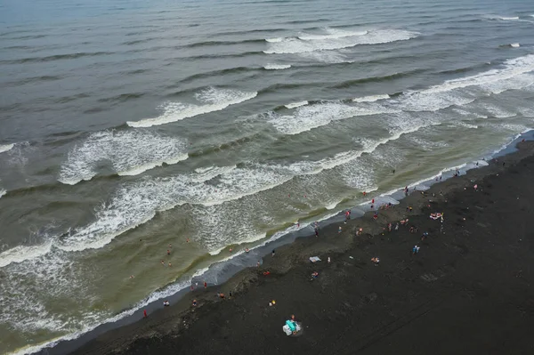 healing black sand beach in georgia. Magnetic sand on the beach in Magnetiti Batumi. High waves in the black Georgian sea in the village of Ureki