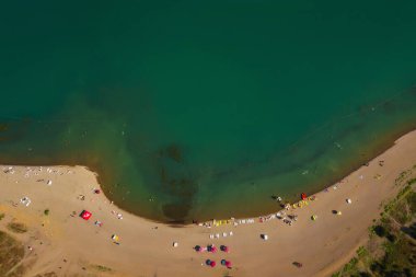 bathing people in tbilisi. beach with sand where people relax. Georgian sea where people swim