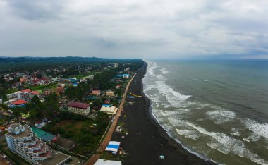Hotels on the coastline with black sand in georgia. Magnetic sand on the beach in Magnetiti Batumi. Therapeutic boarding houses in the Ureki settlement for sick children
