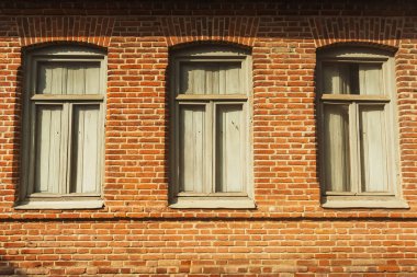 atmospheric windows in old Georgian houses. wooden beautiful windows with shutters in tbilisi. windows with wind protection glass