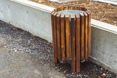 trash bin in georgia tourist place. urn with wooden elements in batumi