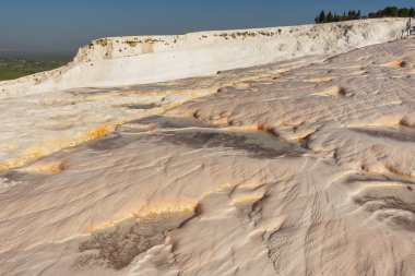 natural pools in turkish pamukkale. texture of white mineral pools in the Turkish reserve. dried minerals from evaporated water