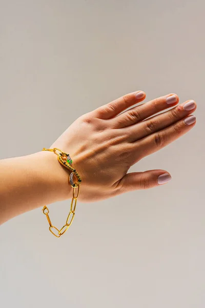 Woman Hand Gold Bracelet White Background Brush Girl Gilded Jewelry — Stock Photo, Image