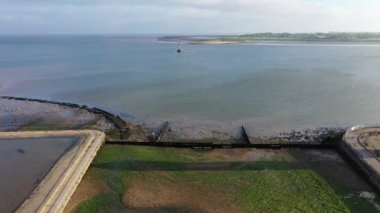 Günbatımında Brightlingsea deniz feneri kulesi, büyüleyici hafif deniz kıyısında özel bir gün, Essex, İngiltere, İngiltere