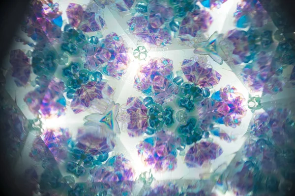 Soyut kaleydoskop arkaplanı. Güzel çok renkli kaleydoskop dokusu. Eşsiz kaleydoskop tasarımı.