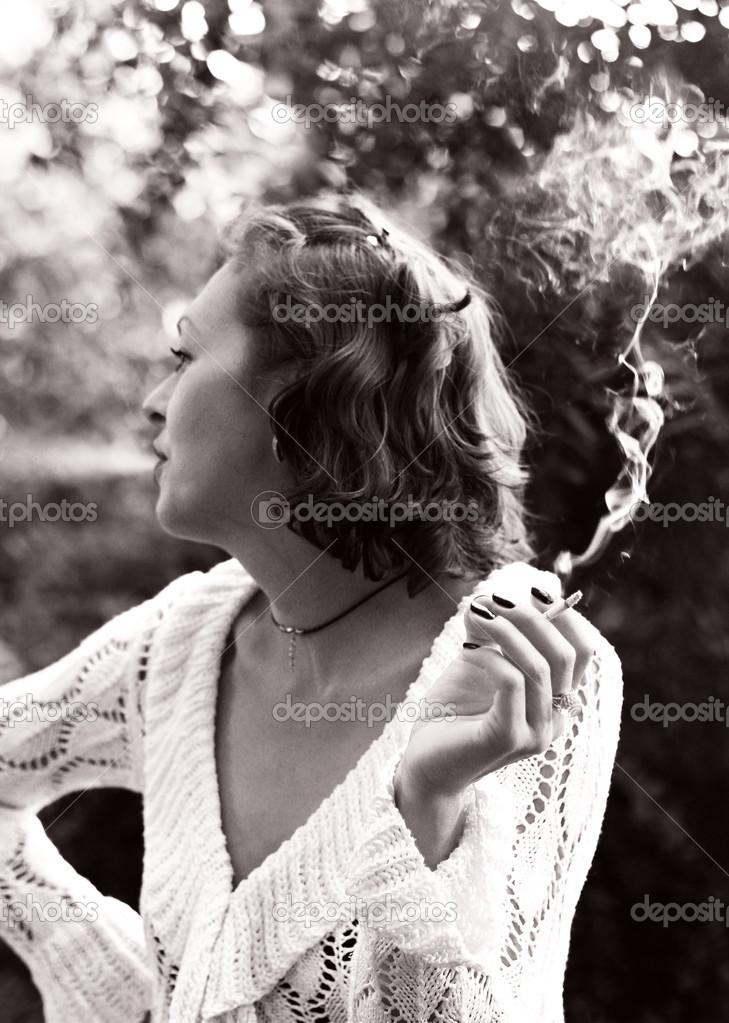Woman smoking in black & white