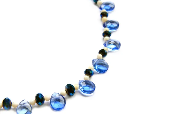 Decoration from transparent blue beads — Stock Photo, Image