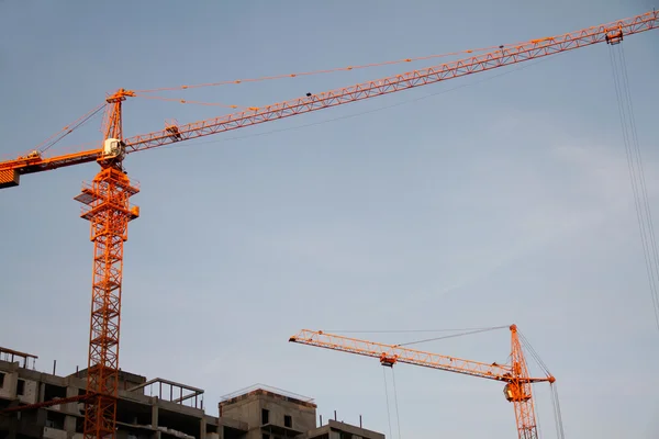 Two cranes on construction site — Stock Photo, Image