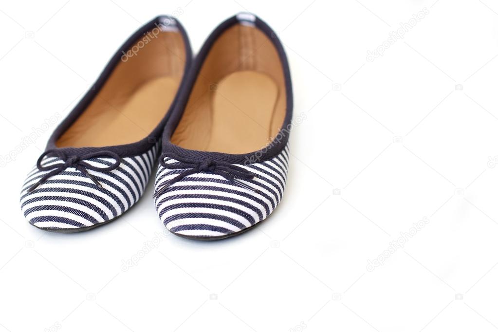 Striped shoes on white background