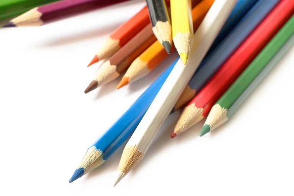 Multicolored pencils close-up on white background Stock Picture