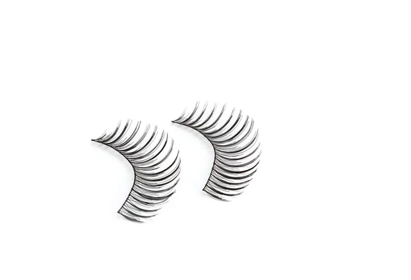 Beyaz arka plan üzerinde izole yanlış eyelashes — Stok fotoğraf