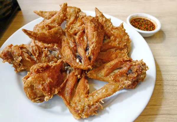 Fried chicken with spicy sauce — Stock Photo, Image