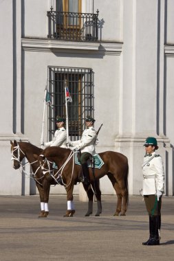 Changing the guard at the Presidential Palace in Santiago - Chil clipart