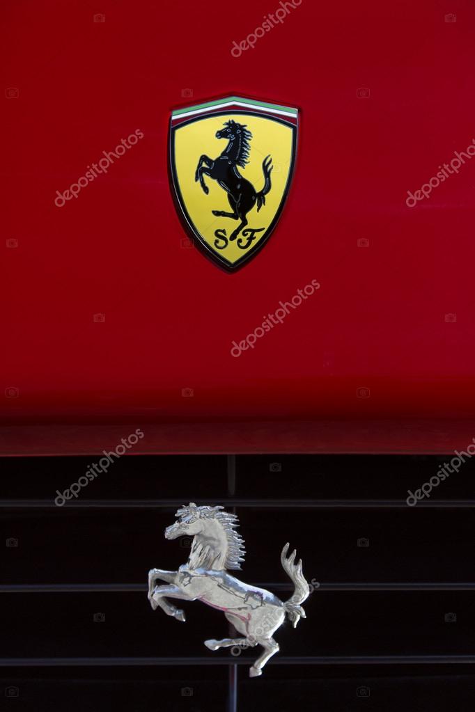 Ferrari 'Prancing Horse' symbol on the front of a Ferrari supercar.
