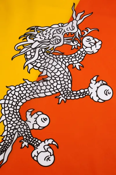 Detail on the flag of the Kingdom of Bhutan — Stock Photo, Image