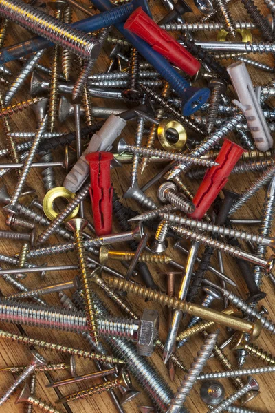 Screws, Bolts, Nails - Wooden Background — Stock Photo, Image