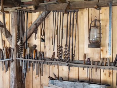 Tools in a carpenters workshop at the Weald and Downland Open Air Museum in West Sussex, southern England. The museum covers 40 acres with over 50 historic buildings dating from 950AD to the 19th century.