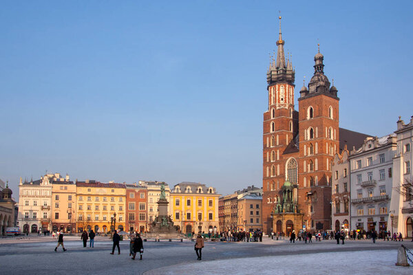 The Church of St Mary in the Main Square (Rynek Glowny) in the city of Krakow in Poland. The gothic basilica is also known as the Church of the Assumption of the Virgin. Dates from the late 13th Century.