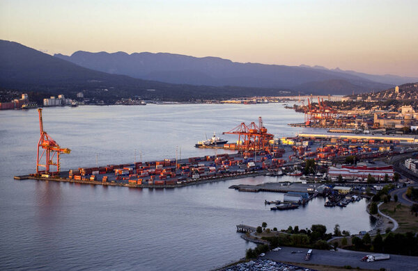 The container port in Vancouver, Canada. The Port of Vancouver is the largest port in Canada and the fourth largest in North America by tonnes of cargo, facilitating trade between Canada and more than 170 world economies.