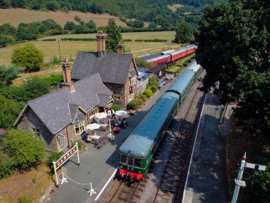 Aerial view of the Llangollen to Carrog Heritage Train in Carrog Station. Denbighshire, North Wales.