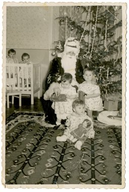 Santa Claus (Grandpa Frost) in the Nursery clipart