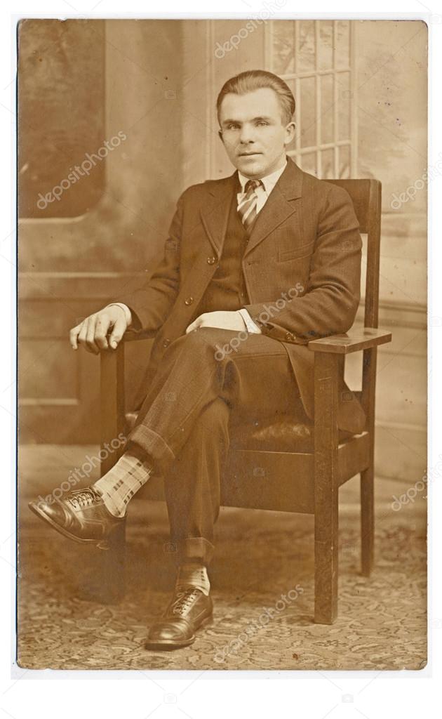 Young man, intellectual - sitting on chair