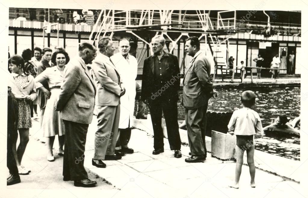 Group of people at the swimming pool (one of a group is Antonin Novotny - President of Czechoslovakia)