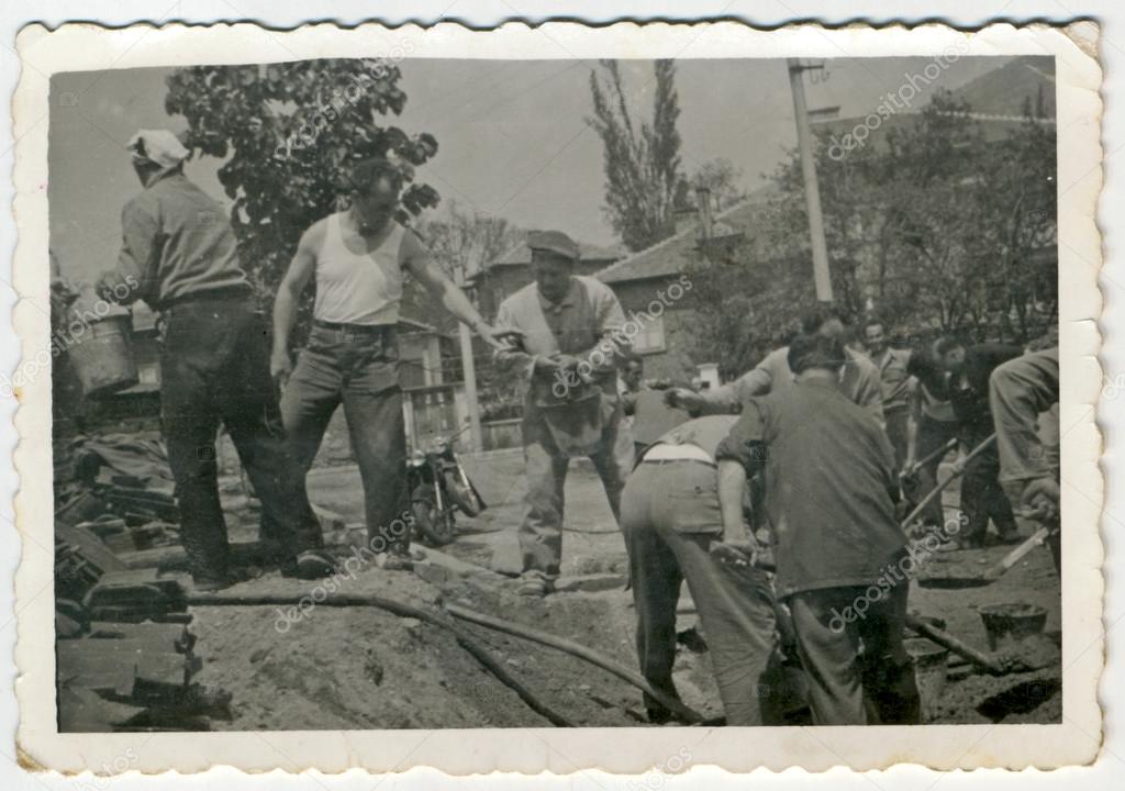 Men working in a village